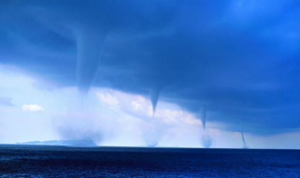 http://www.dailymail.co.uk/news/article-2381462/Stunning-scene-FOUR-waterspouts-Greece-coast-captured-awe-inspiring-photographs.html