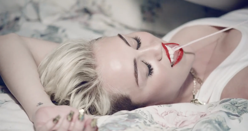 http://www.dailymail.co.uk/tvshowbiz/article-2381129/Miley-Cyrus-sings-praises-marijuana-releases-new-directors-cut-hit-video.html