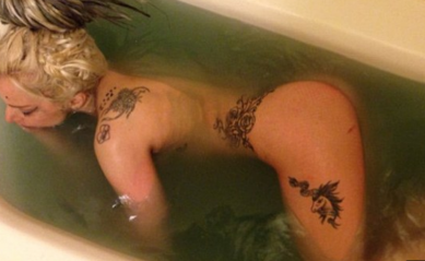http://www.dailymail.co.uk/tvshowbiz/article-2582500/Lady-Gaga-shares-photo-naked-self-murky-bathtub-cleaning-dirty-SXSW-performance.html