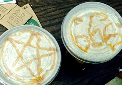 http://www.dailymail.co.uk/news/article-2594303/Starbucks-barista-serves-coffee-satanic-symbols-foam-outraged-Catholic-woman-Sunday.html