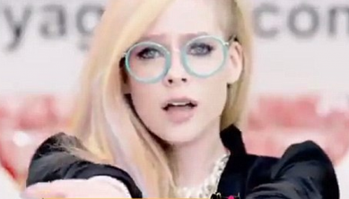 http://www.dailymail.co.uk/tvshowbiz/article-2610855/Avril-Lavigne-shows-slim-figure-plunging-leather-bodice-new-Japanese-techno-inspired-video-Hello-Kitty.html