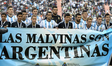 http://www.dailymail.co.uk/news/article-2651961/Argentina-players-pose-banner-proclaiming-The-Falklands-Argentine-World-Cup-warm-match.html